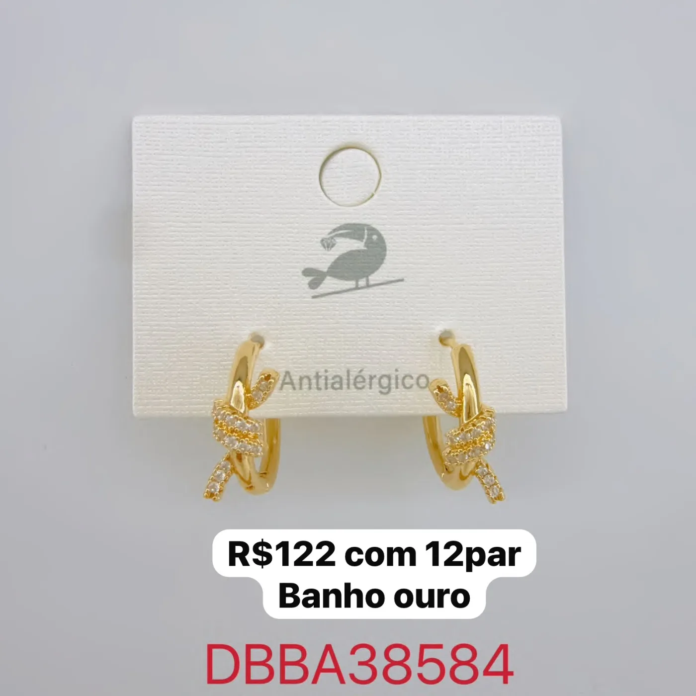 brincos argola com detalhe entrelaçado e pedras