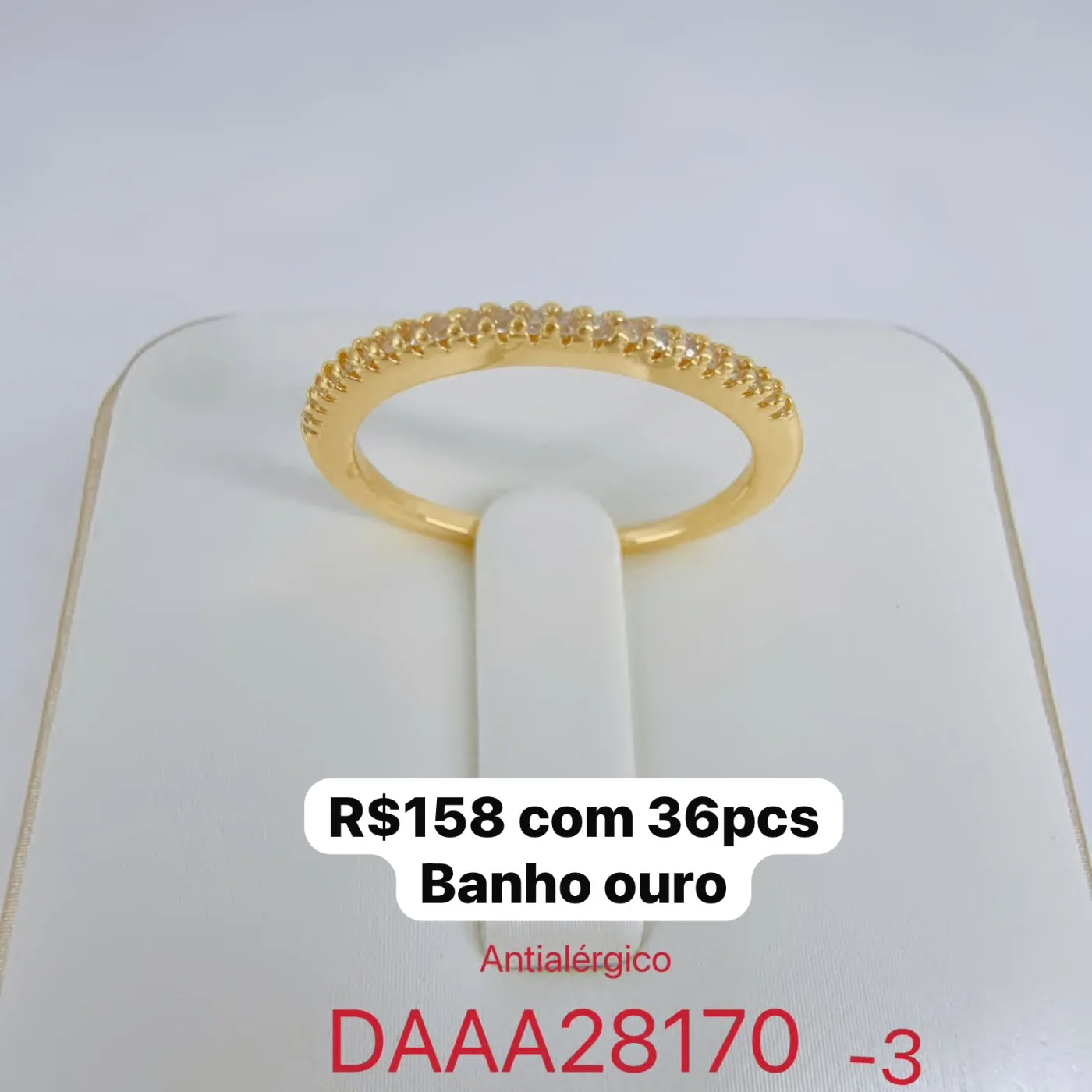 anel fino com pedras pequenas