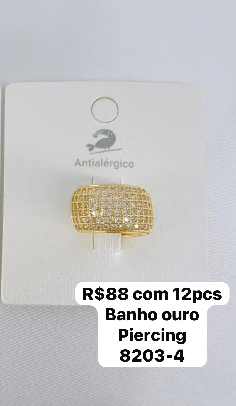 piercing dourado com pedras
