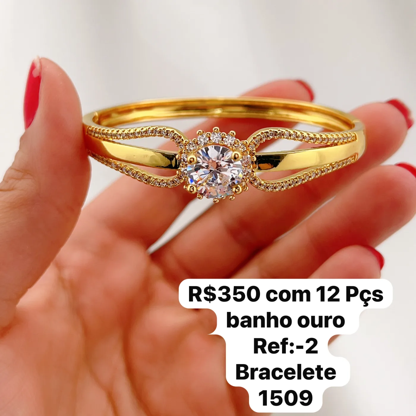 bracelete com pedra central e detalhes de zircônias