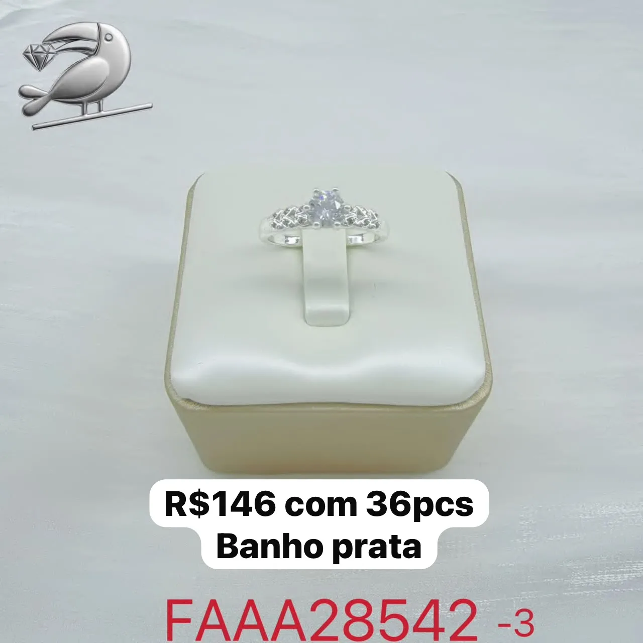 anel com pedra central e detalhes laterais